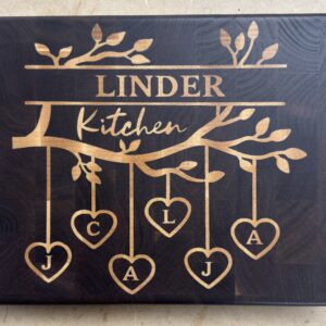 Family tree end grain cutting board with maple inlay — walnut base with family name and initials in hanging hearts